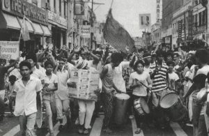 Ilonggos celebrating the fall of Marcos in downtown Iloilo City resulting from the EDSA People Power Revolution of February 1986.