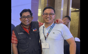 Councilor Peñol (left) with Igbaras town councilor Anthony Estil Autencio