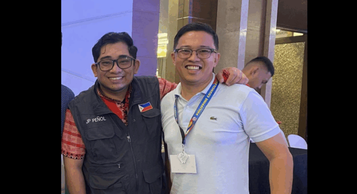 Councilor Peñol (left) with Igbaras town councilor Anthony Estil Autencio